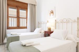 Posteľ alebo postele v izbe v ubytovaní Amplio apartamento en Playa de Regla 2