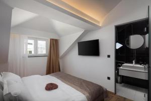 Posteľ alebo postele v izbe v ubytovaní Top rooms