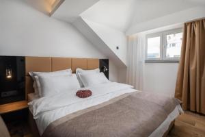 Posteľ alebo postele v izbe v ubytovaní Top rooms