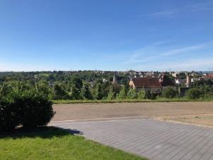 a view of a city from a parking lot at Ferienwohnung 60 m mit hervorragender Aussicht in Talheim