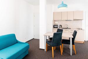 A kitchen or kitchenette at Apartmanovy dom Familia Smokovec