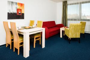 A seating area at Apartmanovy dom Familia Smokovec