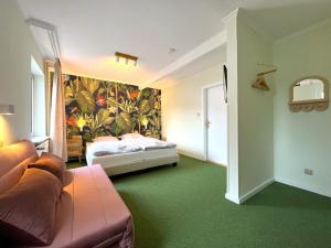 Postel nebo postele na pokoji v ubytování WannerHus Hotel