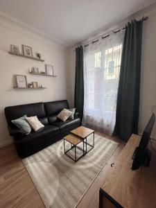Χώρος καθιστικού στο Appartement T2 aux portes de Paris