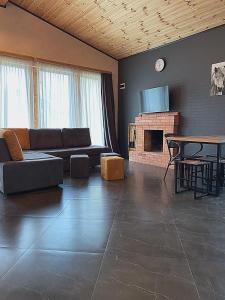 Istumisnurk majutusasutuses TwinSide Chalet Bakuriani