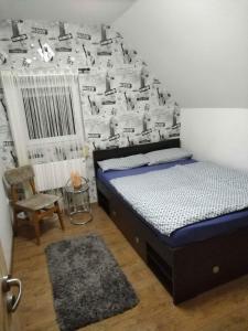Posteľ alebo postele v izbe v ubytovaní Holiday home in Balatonkeresztur 41050
