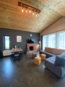 Istumisnurk majutusasutuses TwinSide Chalet Bakuriani