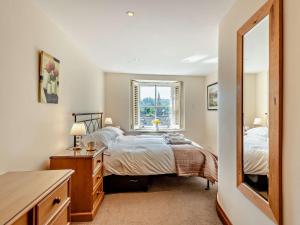 Ένα ή περισσότερα κρεβάτια σε δωμάτιο στο 1 Bed in Ambleside 95118