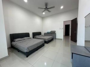 Ένα ή περισσότερα κρεβάτια σε δωμάτιο στο Mount austin 18 pax AR50 pool