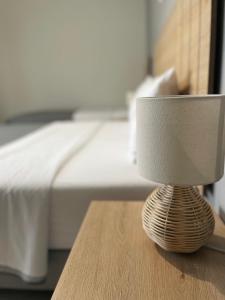 Postel nebo postele na pokoji v ubytování Rondo's Hotel