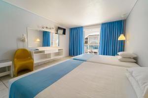 Voodi või voodid majutusasutuse Filoxenia Hotel Zakynthos toas
