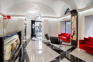 TV a/nebo společenská místnost v ubytování Gioberti Art Hotel
