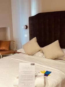 Postel nebo postele na pokoji v ubytování Mandarin Apulia 19 B&B