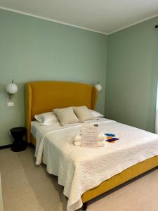 Postel nebo postele na pokoji v ubytování Mandarin Apulia 19 B&B