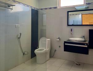 Koupelna v ubytování Fana Resort + 21 fotografií