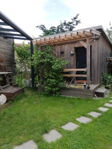 Vonkajšia záhrada v ubytovaní Behagliches Tiny House in Seenähe