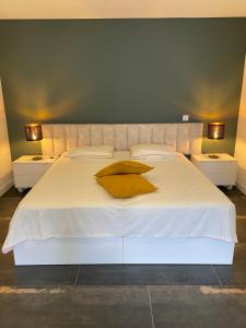 Postel nebo postele na pokoji v ubytování B&B Camacha Porto Santo