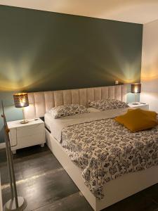 Postel nebo postele na pokoji v ubytování B&B Camacha Porto Santo