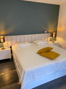 Postel nebo postele na pokoji v ubytování B&B Camacha Porto Santo