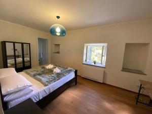 Postel nebo postele na pokoji v ubytování Il Casale delle 7 Querce + 26 fotografií