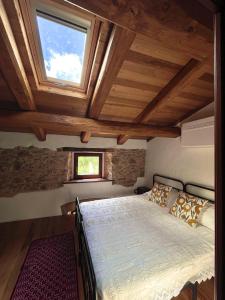 Postel nebo postele na pokoji v ubytování Casa Asproni