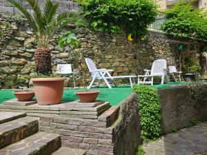 Jardin de l'établissement Affittacamere House LeoMar di Sara