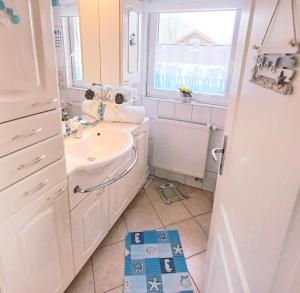 Koupelna v ubytování Lianes Hus + 16 fotografií