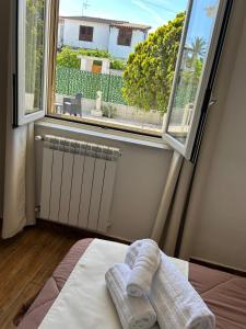 Postel nebo postele na pokoji v ubytování B&B Villa Achibea