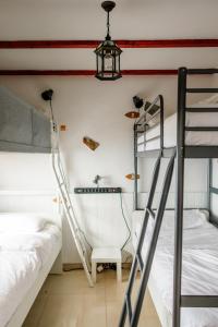 Cama ou camas em um quarto em Casanaga