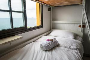Cama ou camas em um quarto em Casanaga