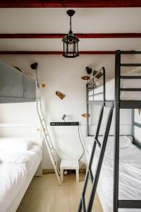 Cama ou camas em um quarto em Casanaga