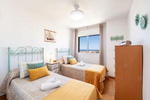 Posteľ alebo postele v izbe v ubytovaní Bonito Piso a 1 minuto de la Playa