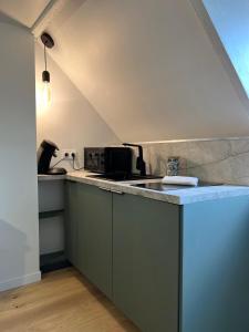 Kuchyň nebo kuchyňský kout v ubytování Le Verdun, Centre de Rennes + 4 fotografie