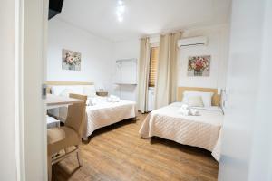 Postel nebo postele na pokoji v ubytování B&B Villa Achibea