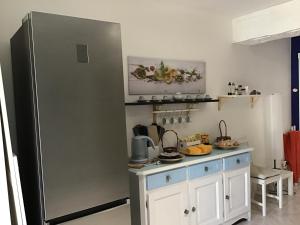 Kuchyň nebo kuchyňský kout v ubytování B&B levante