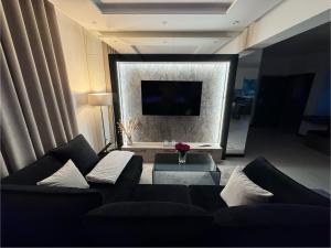 TV a/nebo společenská místnost v ubytování Apartament z Jacuzzi