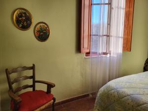 Postel nebo postele na pokoji v ubytování Casa Fleurdelys Toscana