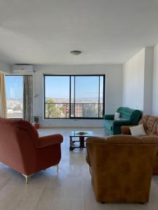 Χώρος καθιστικού στο Deluxe and Luminous Apartment