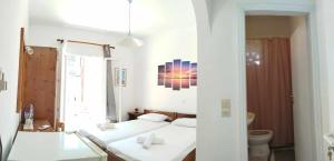 Ένα ή περισσότερα κρεβάτια σε δωμάτιο στο Amethyst room