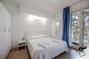 Postel nebo postele na pokoji v ubytování HOTIDAY Room Collection - Lacona