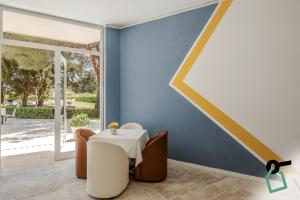 Posezení v ubytování HOTIDAY Room Collection - Lacona