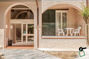 Patio nebo venkovní prostory v ubytování HOTIDAY Room Collection - Lacona
