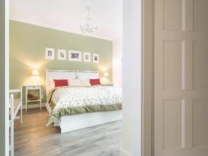 Postel nebo postele na pokoji v ubytování Holiday Home Huty by Interhome