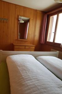 En eller flere senger på et rom på Apartment Bodehus by Interhome