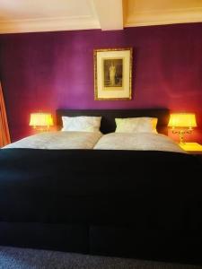 Un pat sau paturi într-o cameră la MALEPARTUS