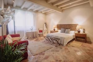 Postel nebo postele na pokoji v ubytování Hotel Finca El Peregrino + 37 fotografií