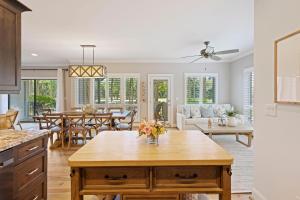 a kitchen and living room with a couch and a table at 4976 Turtle Point in Kiawah Island