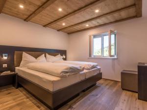 Voodi või voodid majutusasutuse Apartment Haus Bergsonne by Interhome toas