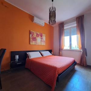 A bed or beds in a room at B&B Domu Mea