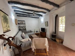 A seating area at Cortijo Vacas Gordas Villas